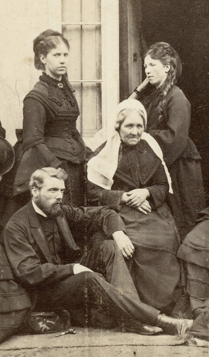 Group in dark clothes, possibly Scottish 3