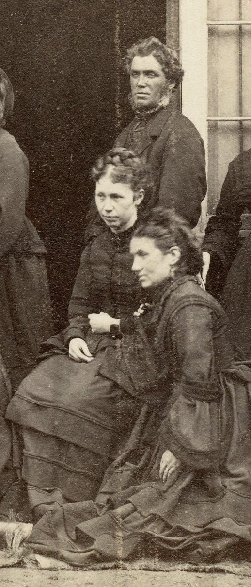 Group in dark clothes, possibly Scottish 4